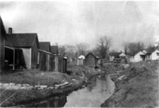 Hinkson Creek with houses built all along it's banks